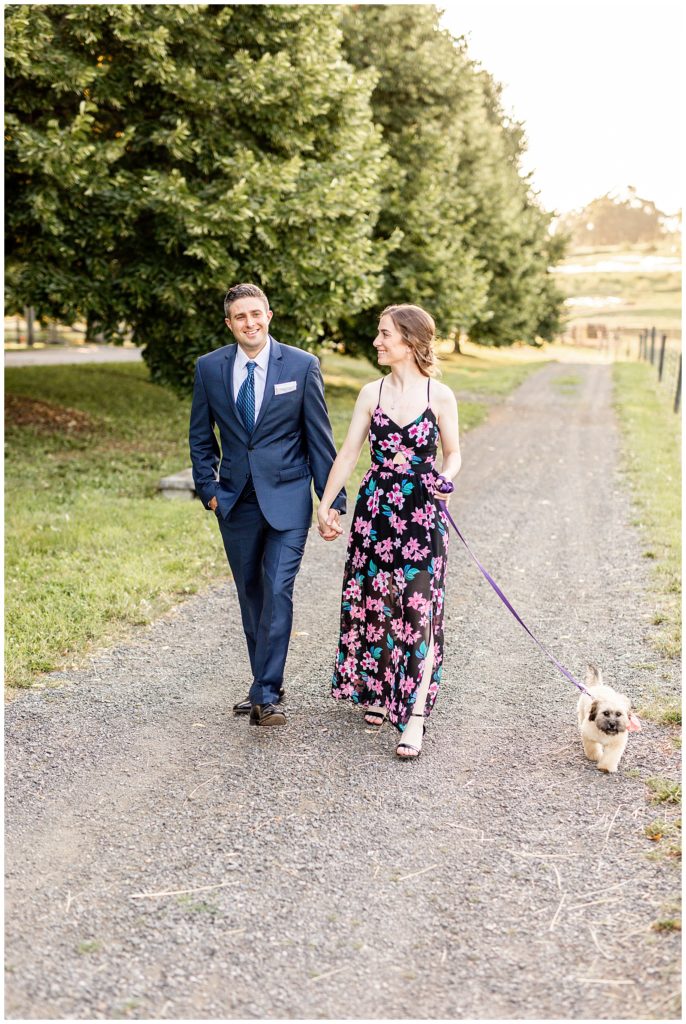 couple-walking-engagement-photo-with-dog