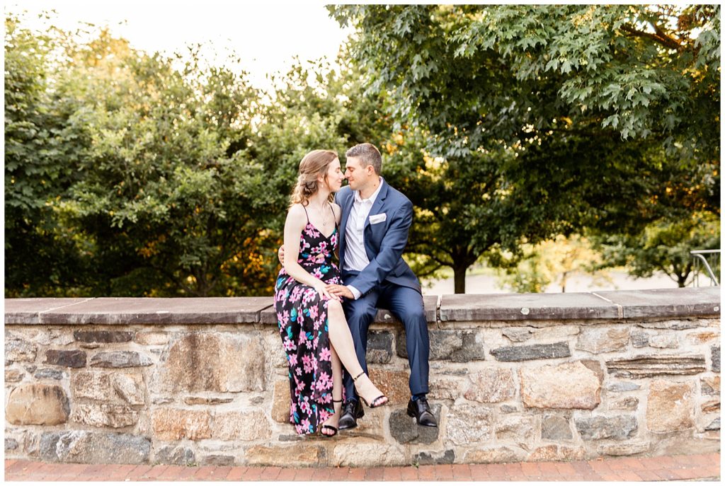 Rockefeller-State-Park-Engagement-Session-couple-on-stone-wall