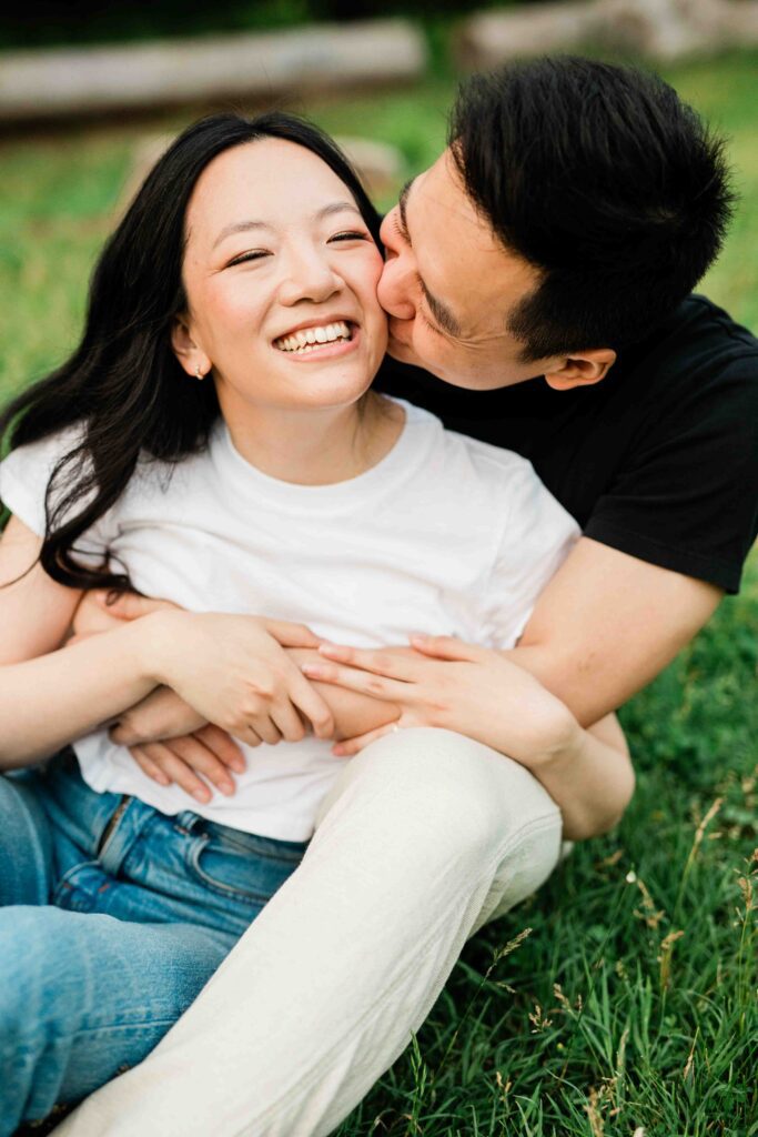 Victoria and Jimmy walking hand-in-hand during their engagement session at Goat Hill Overlook with New Hope engagement photographer