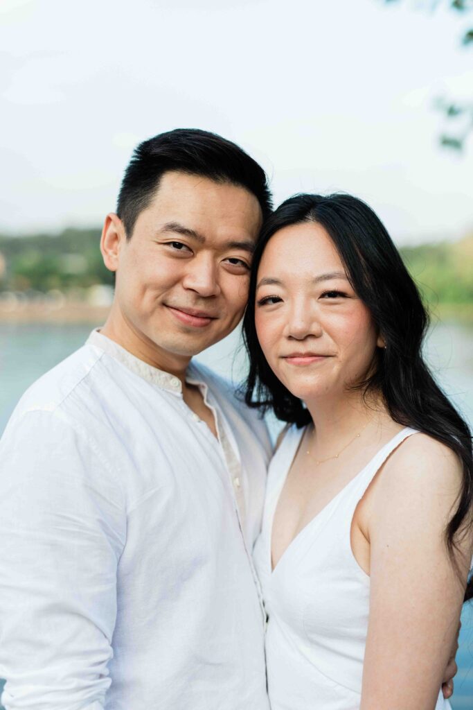Victoria and Jimmy walking hand-in-hand during their engagement session at Goat Hill Overlook with New Hope engagement photographer
